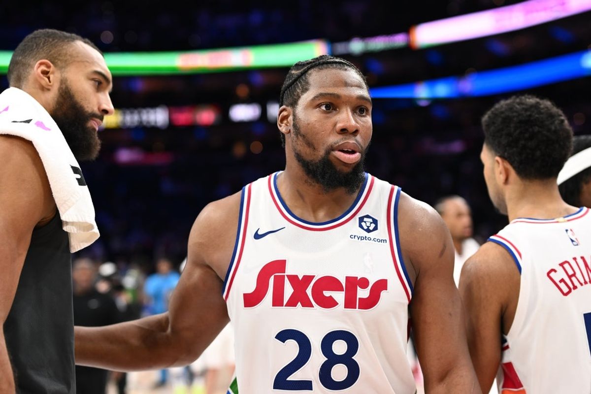Apr 5, 2025; Philadelphia, Pennsylvania, USA; Philadelphia 76ers forward Guerschon Yabusele (28) looks on with Minnesota Timberwolves center Rudy Gobert (27) after the game at Wells Fargo Center. Mandatory Credit: Kyle Ross-Imagn Images