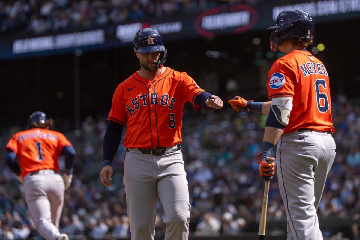 Apr 9, 2025; Seattle, Washington, USA;  Houston Astros first baseman Christian Walker (8) is congratulated by centerfielder Jake Meyers (6) during the third inning against the Seattle Mariners at T-Mobile Park. Mandatory Credit: Stephen Brashear-Imagn Images