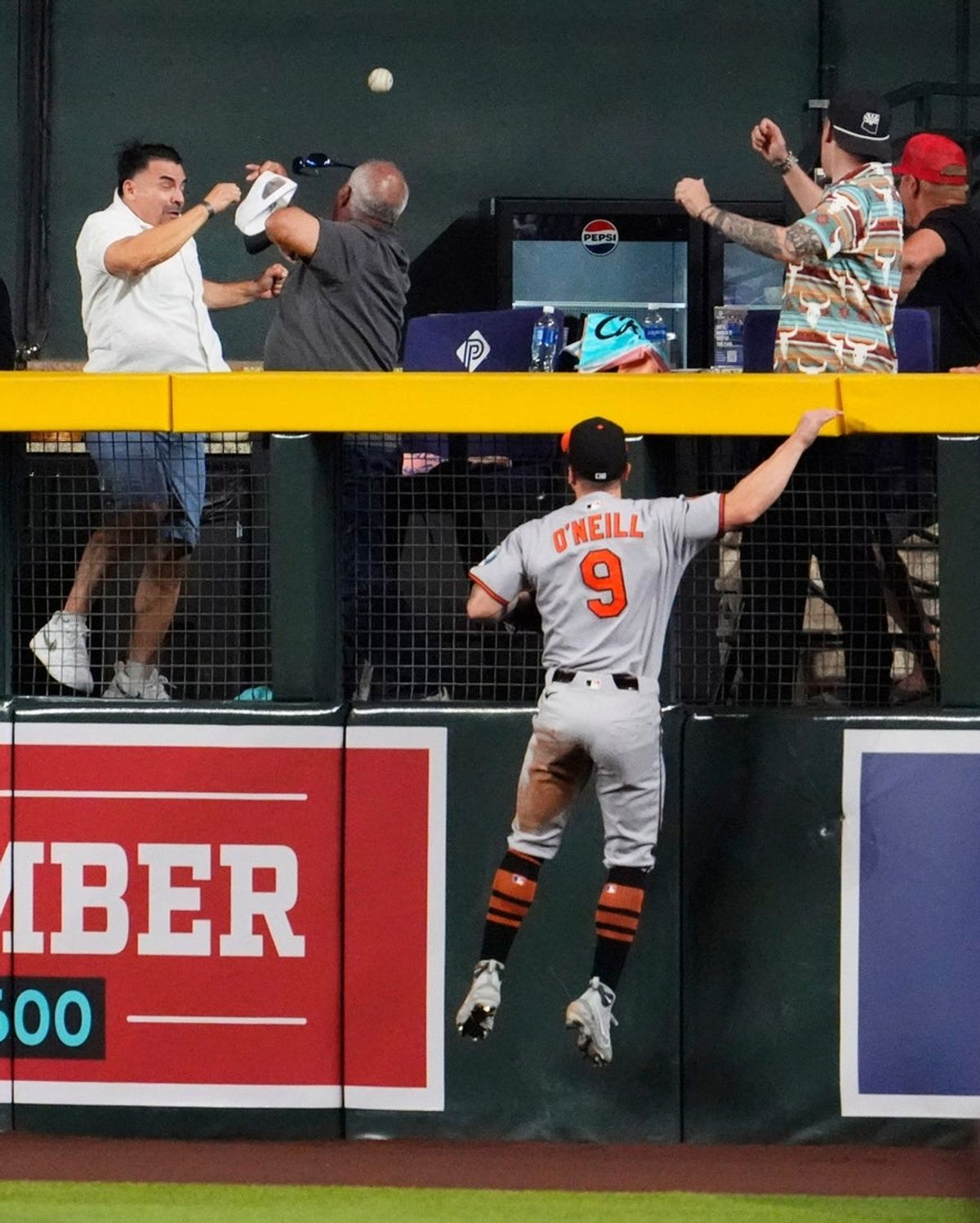 Arizona Diamondbacks Corbin Carroll hits a home run over Baltimore Orioles centerfielder Tyler O'Neill in the third inning at Chase Field in Phoenix, on April 9, 2025.