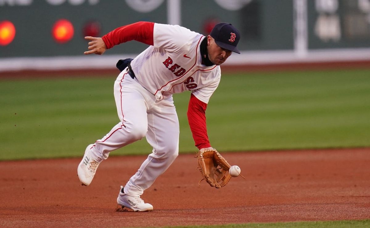 Apr 9, 2025; Boston, Massachusetts, USA; Boston Red Sox third base Alex Bregman (2) makes the play at third base against the Toronto Blue Jays in the first inning at Fenway Park. Mandatory Credit: David Butler II-Imagn Images