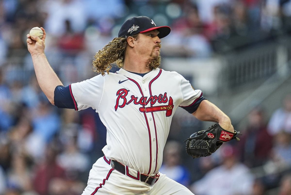 Apr 9, 2025; Cumberland, Georgia, USA; Atlanta Braves pitcher Grant Holmes (66) pitches against the Philadelphia Phillies during the first inning at Truist Park. Mandatory Credit: Dale Zanine-Imagn Images