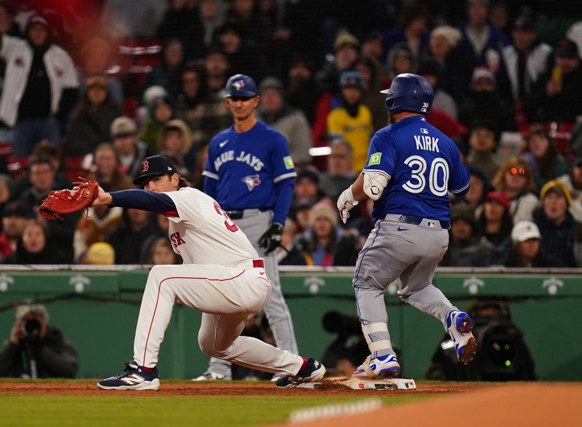 Apr 9, 2025; Boston, Massachusetts, USA; Boston Red Sox first base Triston Casas (36) completes a double play against Toronto Blue Jays catcher Alejandro Kirk (30) in the seventh inning at Fenway Park. Mandatory Credit: David Butler II-Imagn Images