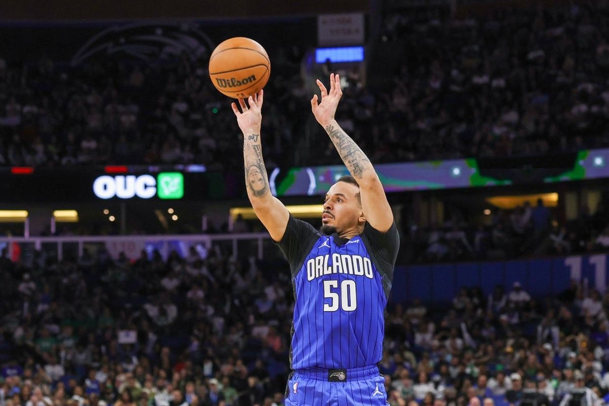Apr 9, 2025; Orlando, Florida, USA; Orlando Magic guard Cole Anthony (50) shoots a three point basket during the second half against the Boston Celtics at Kia Center. Mandatory Credit: Mike Watters-Imagn Images