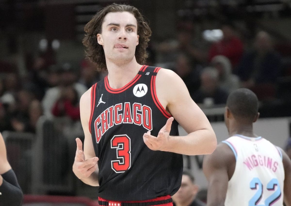 Apr 9, 2025; Chicago, Illinois, USA; Chicago Bulls guard Josh Giddey (3) gestures after making a three point basket against the Miami Heat during the second half at United Center. Mandatory Credit: David Banks-Imagn Images