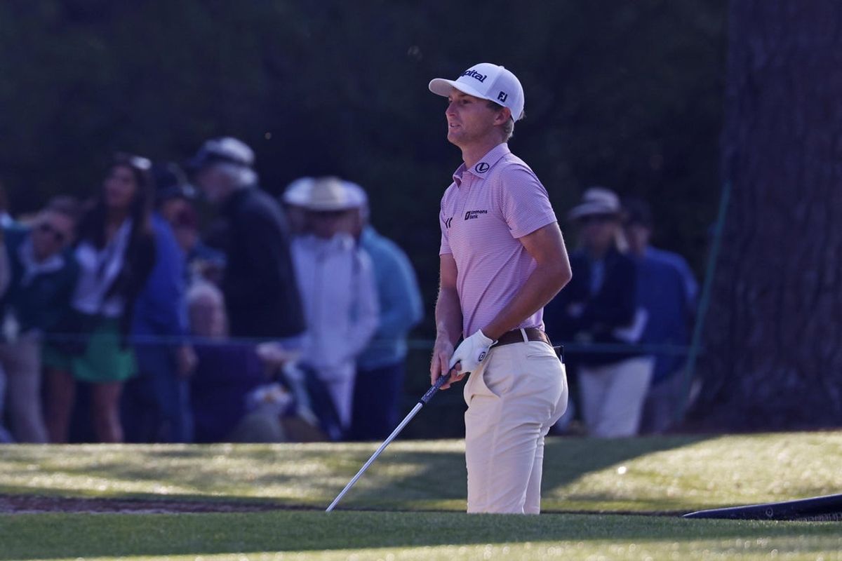Apr 10, 2025; Augusta, Georgia, USA; Will Zalatoris plays out of the bunker on the first green during the first round of the Masters Tournament. Mandatory Credit: Peter Casey-Imagn Images
