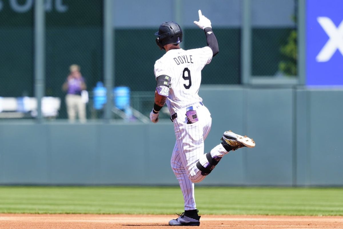 Apr 10, 2025; Denver, Colorado, USA; Colorado Rockies center fielder Brenton Doyle (9) rounds the bases after a solo home run in the first inning against the Milwaukee Brewers at Coors Field. Mandatory Credit: Ron Chenoy-Imagn Images