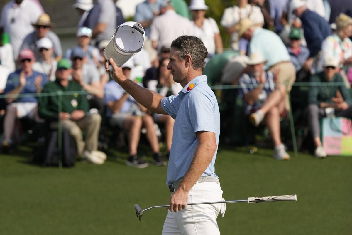 Apr 10, 2025; Augusta, Georgia, USA; Justin Rose reacts on the 18th green during the first round of the Masters Tournament. Mandatory Credit: Michael Madrid-Imagn Images