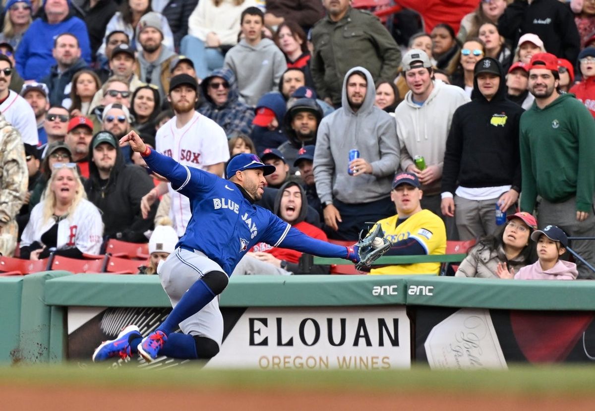 Apr 10, 2025; Boston, Massachusetts, USA; Toronto Blue Jays right fielder George Springer (4) makes a catch for an out against the Boston Red Sox during the sixth inning at Fenway Park. Mandatory Credit: Eric Canha-Imagn Images