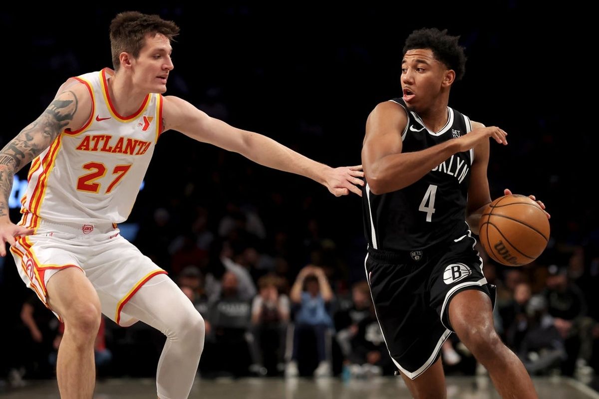 Apr 10, 2025; Brooklyn, New York, USA; Brooklyn Nets guard Reece Beekman (4) controls the ball against Atlanta Hawks guard Vit Krejci (27) during the first quarter at Barclays Center. Mandatory Credit: Brad Penner-Imagn Images