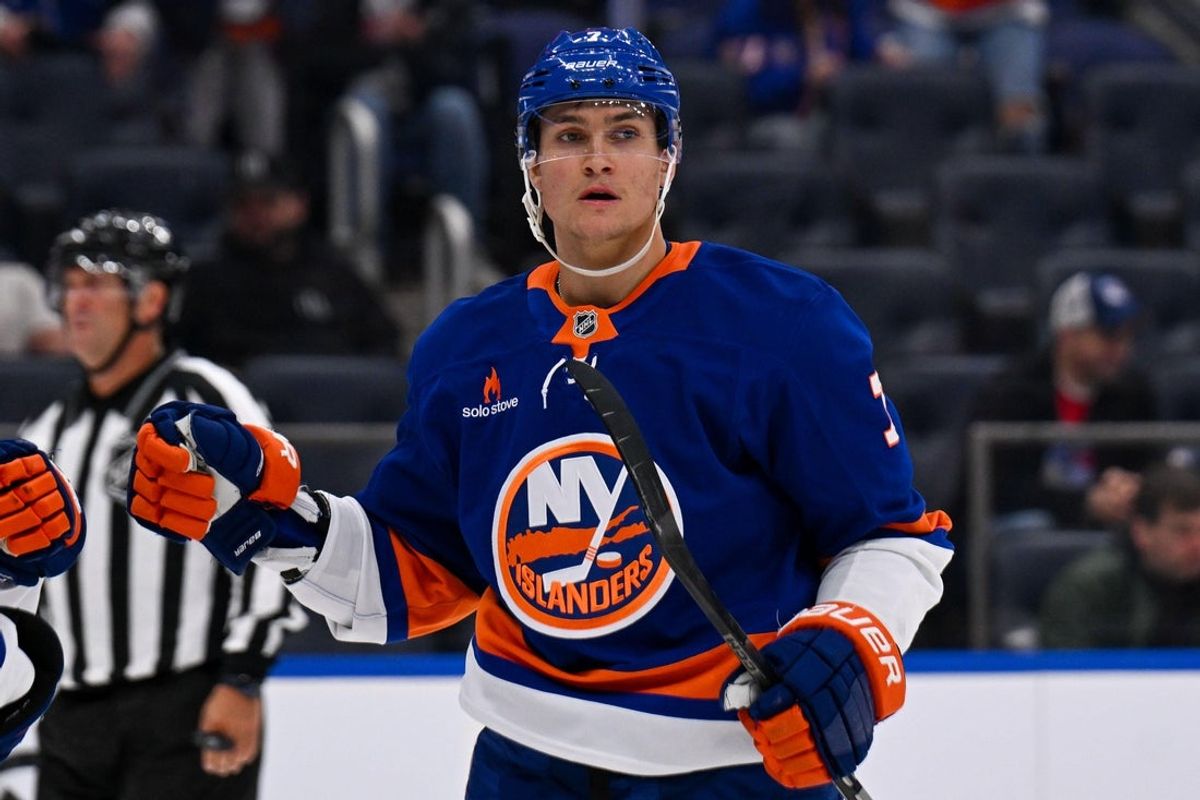 Apr 10, 2025; Elmont, New York, USA;  New York Islanders right wing Maxim Tsyplakov (7) celebrates his power play goal against the New York Rangers during the second period at UBS Arena. Mandatory Credit: Dennis Schneidler-Imagn Images