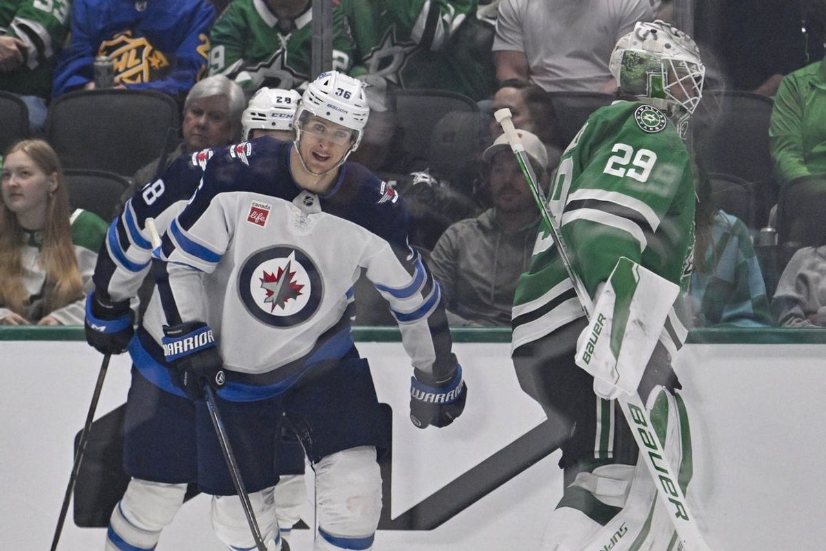 Apr 10, 2025; Dallas, Texas, USA; Winnipeg Jets center Morgan Barron (36) skates off the ice after scoring a goal against Dallas Stars goaltender Jake Oettinger (29) during the second period at the American Airlines Center. Mandatory Credit: Jerome Miron-Imagn Images