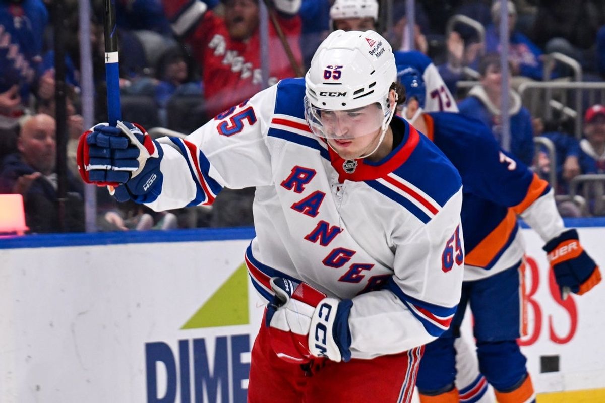 Apr 10, 2025; Elmont, New York, USA;  New York Rangers left wing Brett Berard (65) celebrates his goal against the New York Islanders during the third period at UBS Arena. Mandatory Credit: Dennis Schneidler-Imagn Images
