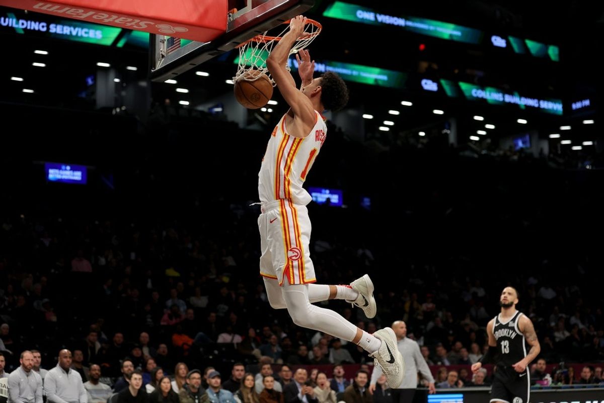 Apr 10, 2025; Brooklyn, New York, USA; Atlanta Hawks forward Zaccharie Risacher (10) dunks against the Brooklyn Nets during the third quarter at Barclays Center. Mandatory Credit: Brad Penner-Imagn Images