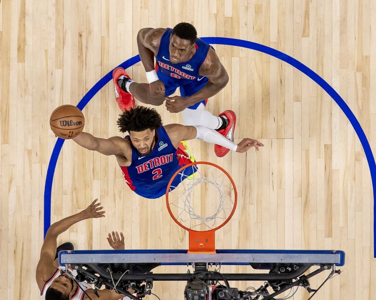 Apr 10, 2025; Detroit, Michigan, USA; Detroit Pistons guard Cade Cunningham (2) drives to the basket for two points against the New York Knicks during the second half at Little Caesars Arena. Mandatory Credit: David Reginek-Imagn Images