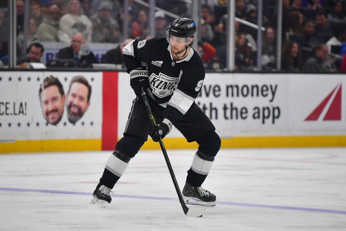 Apr 10, 2025; Los Angeles, California, USA; Los Angeles Kings right wing Adrian Kempe (9) controls the puck against the Anaheim Ducks during the second period at Crypto.com Arena. Mandatory Credit: Gary A. Vasquez-Imagn Images