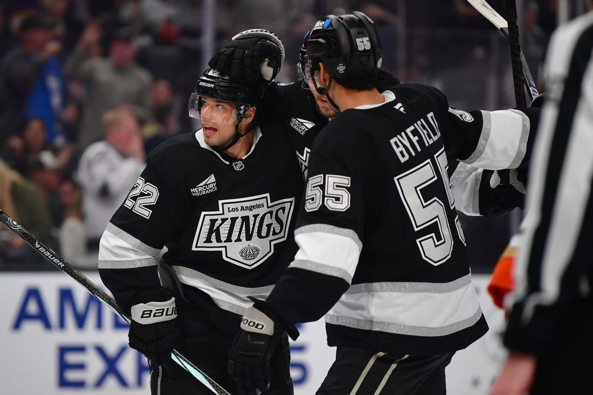 Apr 10, 2025; Los Angeles, California, USA; Los Angeles Kings left wing Kevin Fiala (22) celebrates his power play goal scored against the Anaheim Ducks with right wing Quinton Byfield (55) during the second period at Crypto.com Arena. Mandatory Credit: Gary A. Vasquez-Imagn Images