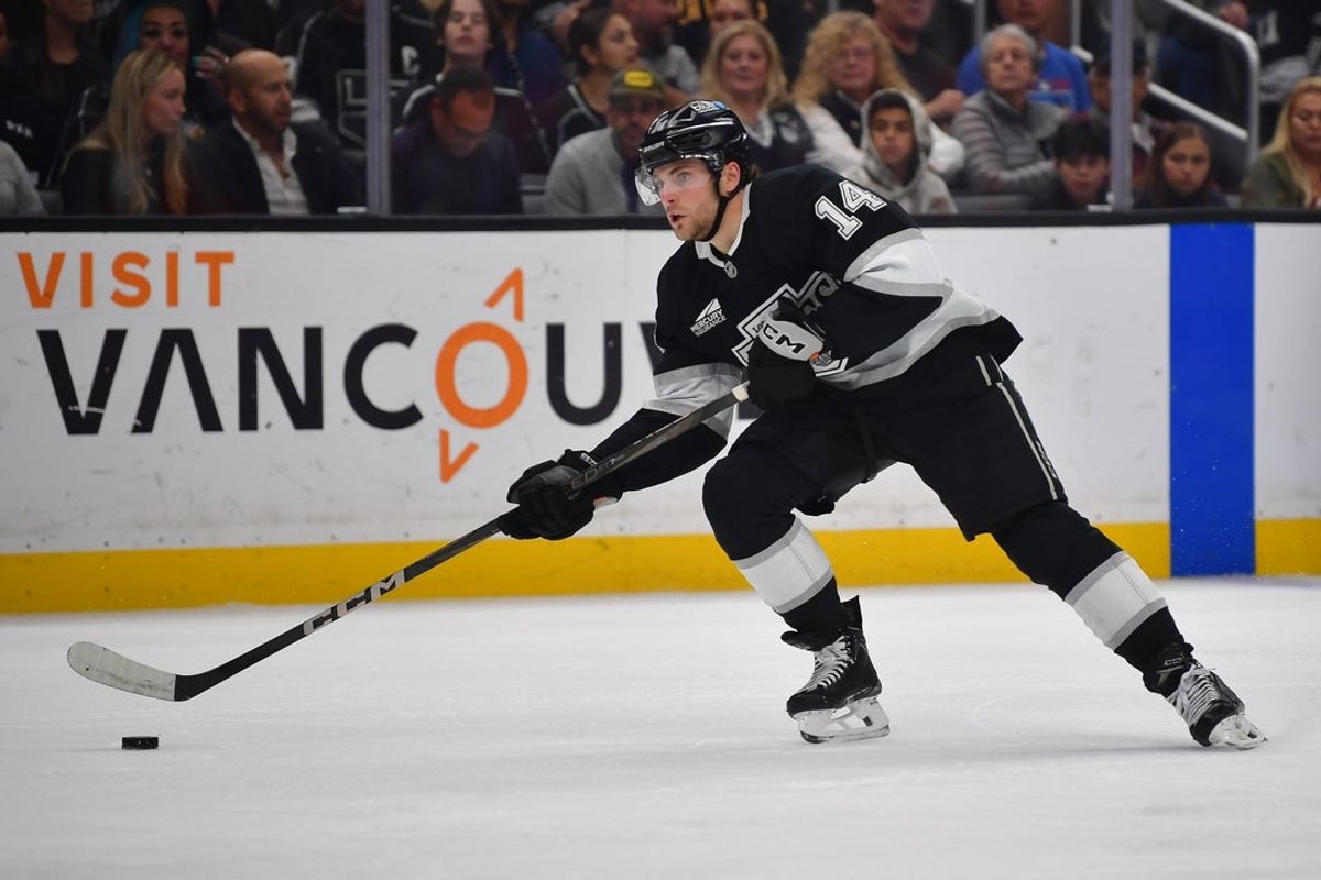 Apr 10, 2025; Los Angeles, California, USA; Los Angeles Kings right wing Alex Laferriere (14) moves in for a shot against the Anaheim Ducks during the second period at Crypto.com Arena. Mandatory Credit: Gary A. Vasquez-Imagn Images