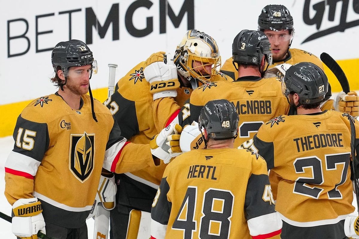 Apr 10, 2025; Las Vegas, Nevada, USA; Vegas Golden Knights goaltender Adin Hill (33) celebrates with team mates after defeating the Seattle Kraken 2-1 at T-Mobile Arena. Mandatory Credit: Stephen R. Sylvanie-Imagn Images