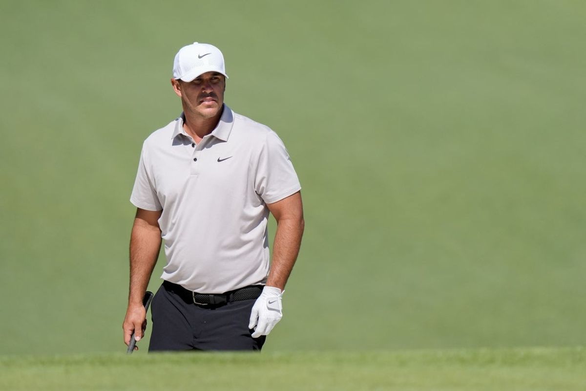 Apr 11, 2025; Augusta, Georgia, USA; Brooks Koepka approaches the no. 7 green during the second round of the Masters Tournament at Augusta National Golf Club. Mandatory Credit: Katie Goodale-Imagn Images
