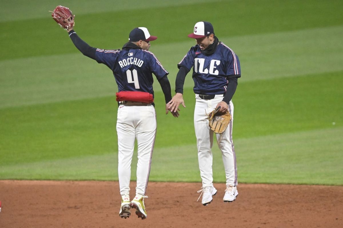 Apr 11, 2025; Cleveland, Ohio, USA; Cleveland Guardians shortstop Brayan Rocchio (4) and left fielder Steven Kwan (38) celebrate a win over the Kansas City Royals at Progressive Field. Mandatory Credit: David Richard-Imagn Images