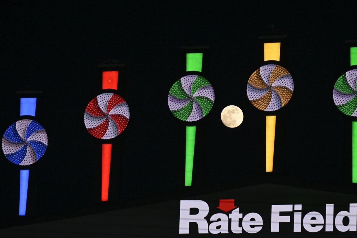 Apr 11, 2025; Chicago, Illinois, USA; The “pink moon” is seen near the pinwheels during a game between the Boston Red Sox and Chicago White Sox at Guaranteed Rate Field. Mandatory Credit: Matt Marton-Imagn Images