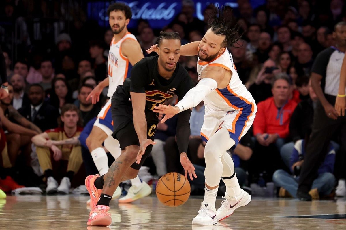 Apr 11, 2025; New York, New York, USA; Cleveland Cavaliers guard Darius Garland (10) and New York Knicks guard Jalen Brunson (11) fight for a loose ball during the fourth quarter at Madison Square Garden. Mandatory Credit: Brad Penner-Imagn Images
