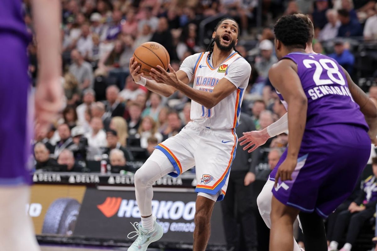 Apr 11, 2025; Salt Lake City, Utah, USA;  Oklahoma City Thunder guard Isaiah Joe (11) tries to past the ball against the Utah Jazz during the second quarter at Delta Center. Mandatory Credit: Chris Nicoll-Imagn Images