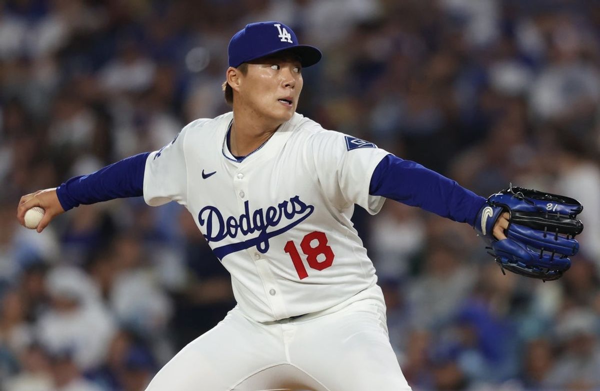 Apr 11, 2025; Los Angeles, California, USA; Los Angeles Dodgers pitcher Yoshinobu Yamamoto (18) throws during the third inning against the Chicago Cubs at Dodger Stadium. Mandatory Credit: Kiyoshi Mio-Imagn Images