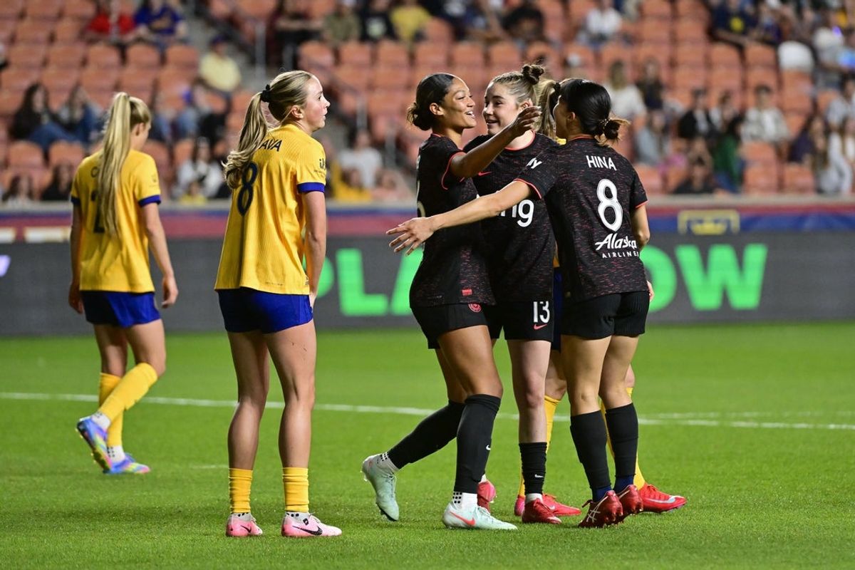 Apr 11, 2025; Sandy, Utah, USA; Portland Thorns FC forward Reilyn Turner (66) celebrates after scoring against the Utah Royals during the first half at America First Field. Mandatory Credit: Christopher Creveling-Imagn Images