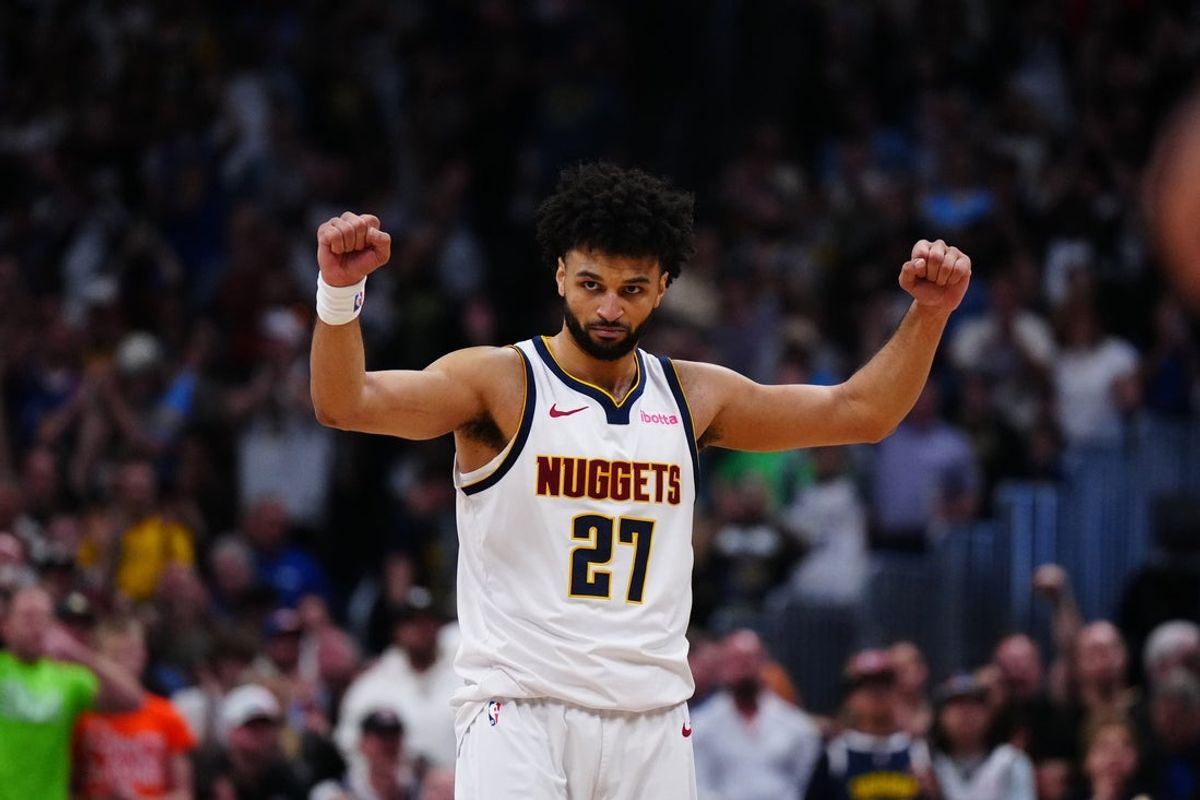 Apr 11, 2025; Denver, Colorado, USA; Denver Nuggets guard Jamal Murray (27) celebrates defeating the Memphis Grizzlies at Ball Arena. Mandatory Credit: Ron Chenoy-Imagn Images