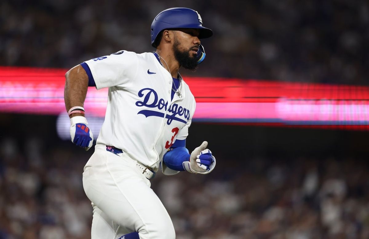 Apr 11, 2025; Los Angeles, California, USA; Los Angeles Dodgers outfielder Teoscar Hernandez (37) singles during the sixth inning against the Chicago Cubs at Dodger Stadium. Mandatory Credit: Kiyoshi Mio-Imagn Images
