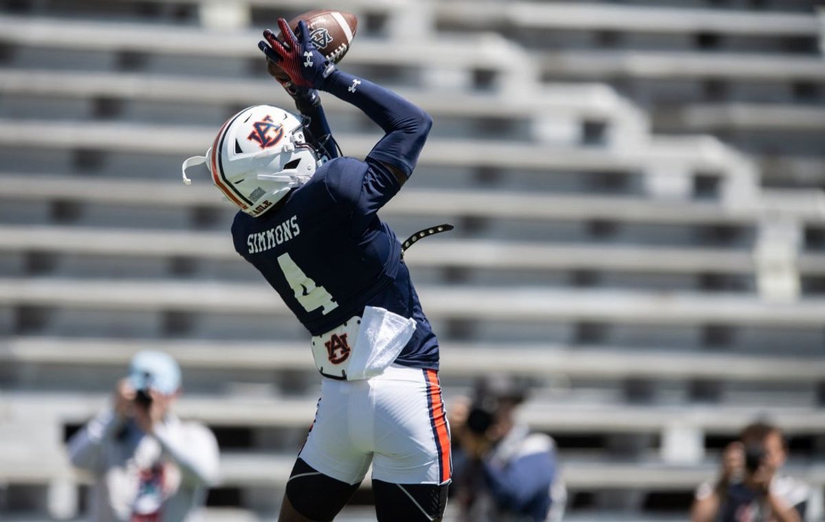 Auburn Tigers wide receiver Malcolm Simmons (4) catches a pass during Auburn Tigers A-Day football practice at Jordan-Hare Stadium in Auburn, Ala., on Saturday, April 12, 2025.