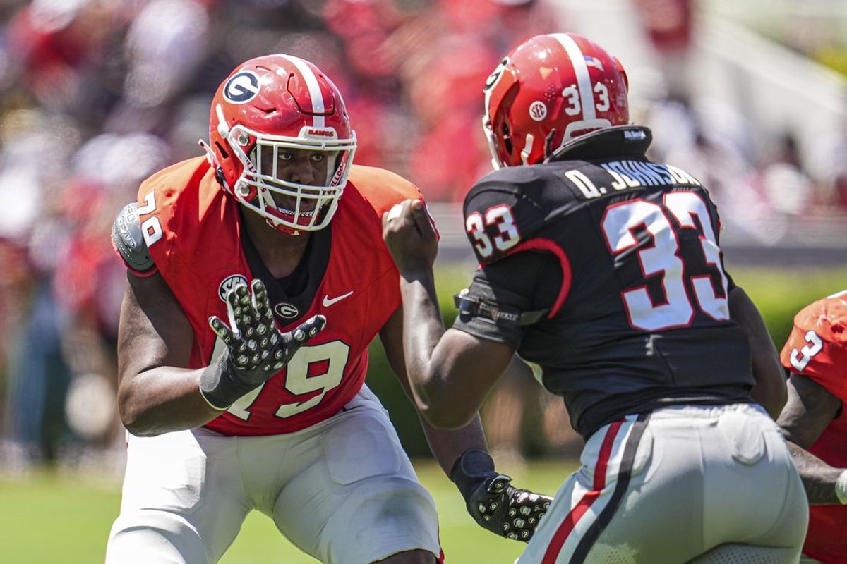 Apr 12, 2025; Athens, GA, USA; Georgia Bulldogs offensive lineman Nyier Daniels (79) blocks against Georgia outside linebacker Quintavius Johnson (33) during the Georgia Spring game at Sanford Stadium. Mandatory Credit: Dale Zanine-Imagn Images