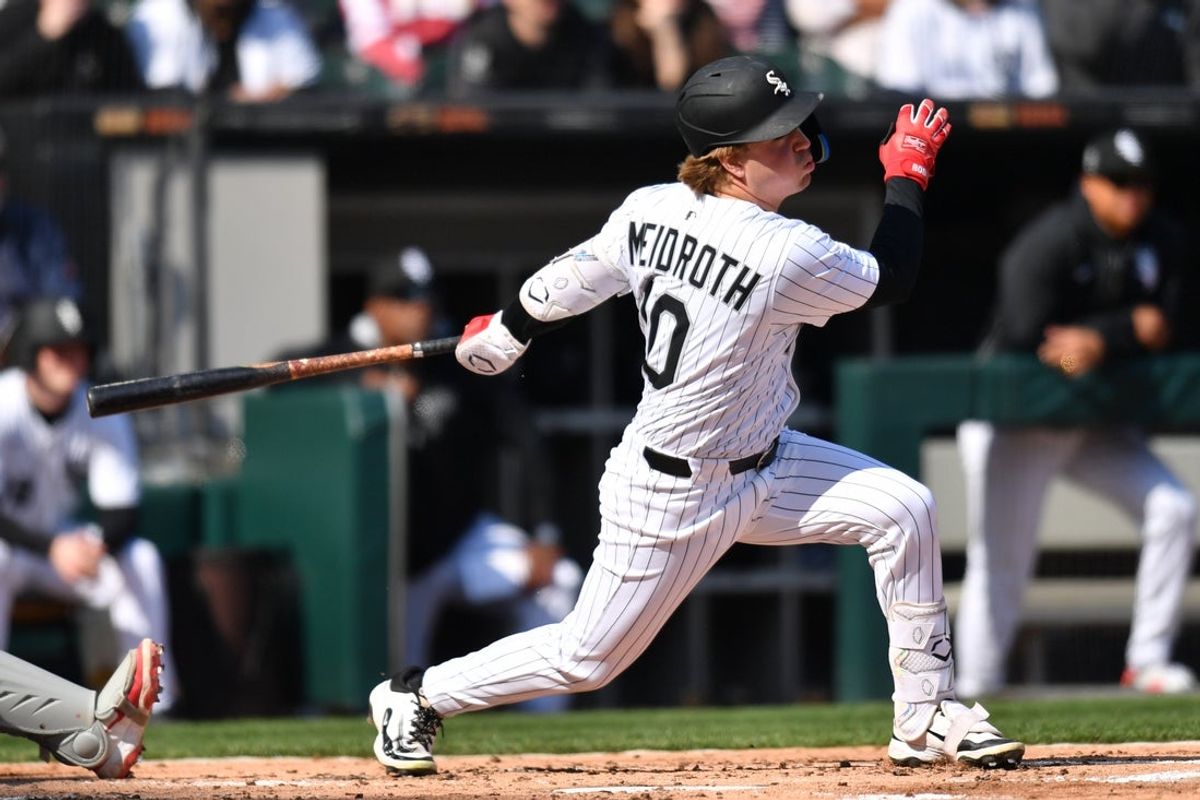 Apr 12, 2025; Chicago, Illinois, USA; Chicago White Sox shortstop Chase Meidroth (10) hits a single during the second inning against the Boston Red Sox at Rate Field. Mandatory Credit: Patrick Gorski-Imagn Images