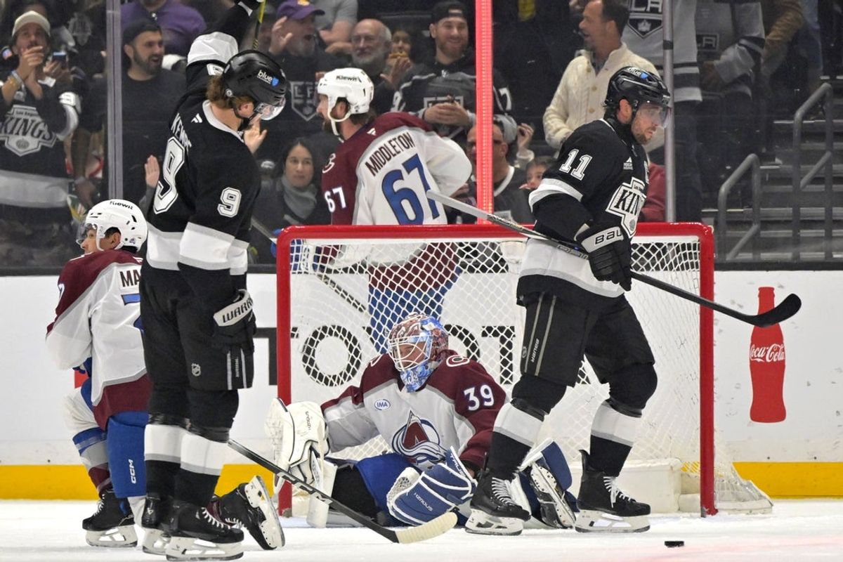 Apr 12, 2025; Los Angeles, California, USA; Los Angeles Kings right wing Adrian Kempe (9) and center Anze Kopitar (11) celebrate after a goal past Colorado Avalanche goaltender Mackenzie Blackwood (39) during the first period at Crypto.com Arena. Mandatory Credit: Jayne Kamin-Oncea-Imagn Images