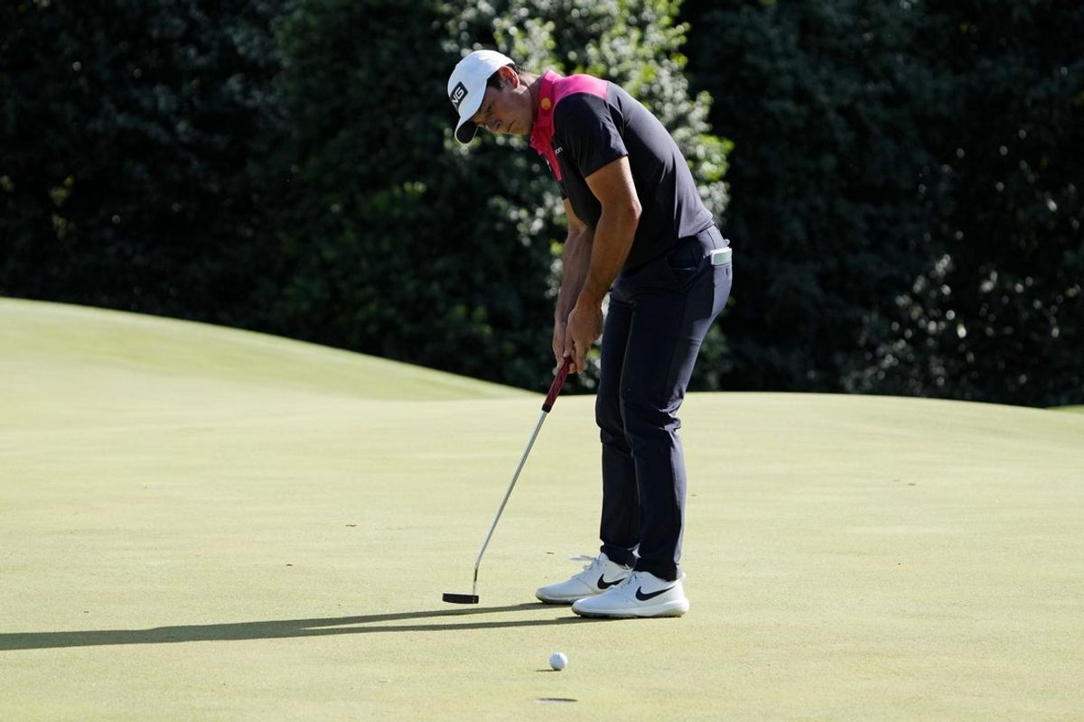Apr 12, 2025; Augusta, Georgia, USA; Viktor Hovland lines up his putt on the 14th green during the third round of the Masters Tournament at Augusta National Golf Club. Mandatory Credit: Kyle Terada-Imagn Images