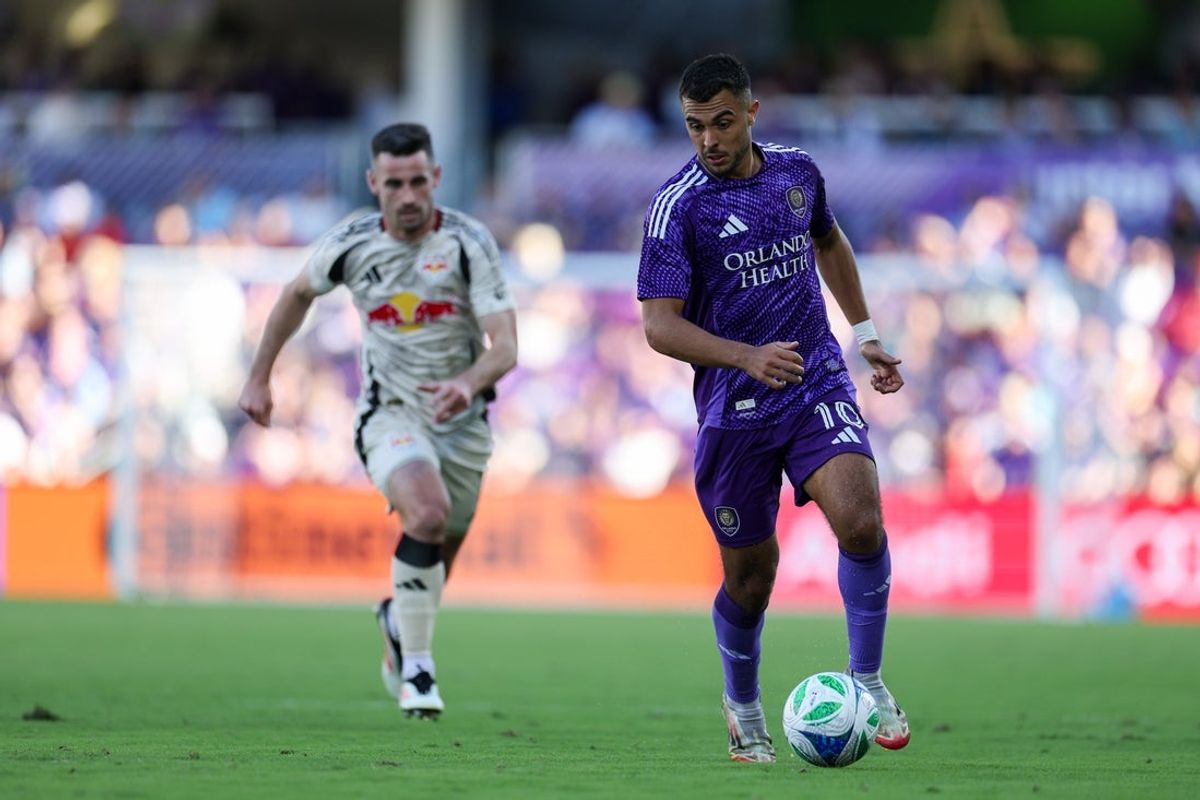 Apr 12, 2025; Orlando, Florida, USA; Orlando City midfielder Martin Ojeda (10) controls the ball against the New York Red Bulls in the second half at Inter&Co Stadium. Mandatory Credit: Nathan Ray Seebeck-Imagn Images