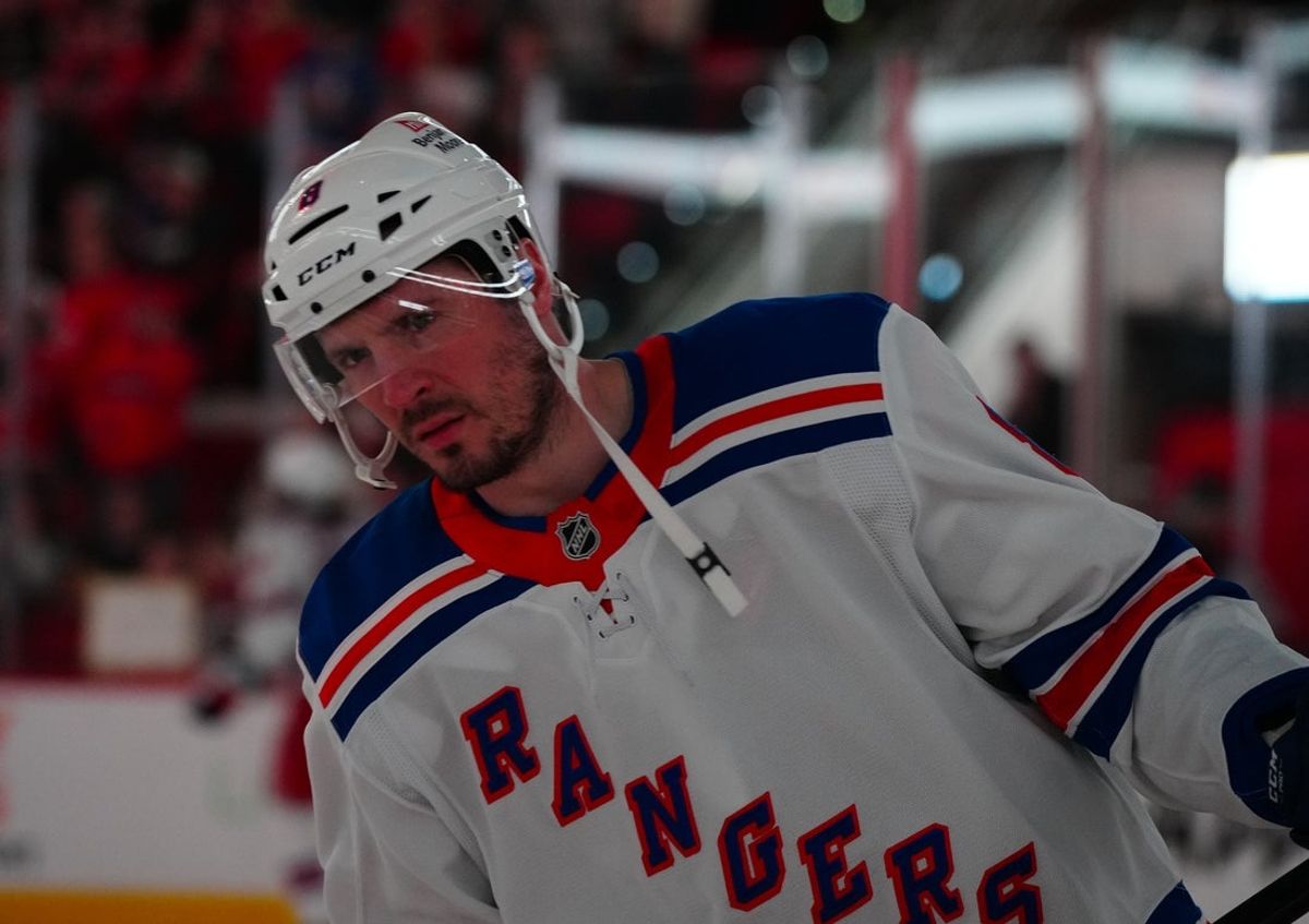 Apr 12, 2025; Raleigh, North Carolina, USA;  New York Rangers left wing J.T. Miller (8) skates before the start of the game against the Carolina Hurricanes at Lenovo Center. Mandatory Credit: James Guillory-Imagn Images