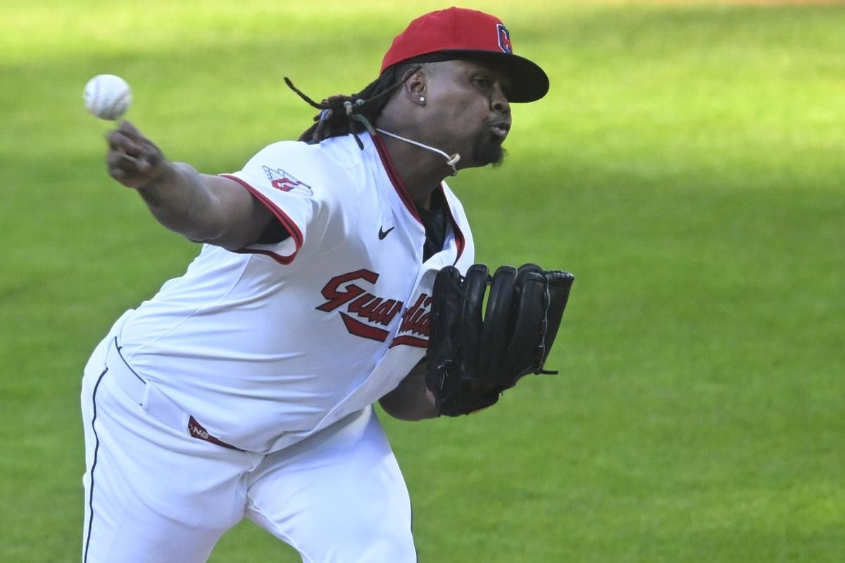 Apr 12, 2025; Cleveland, Ohio, USA; Cleveland Guardians starting pitcher Luis L. Ortiz (45) delivers a pitch in the first inning against the Kansas City Royals at Progressive Field. Mandatory Credit: David Richard-Imagn Images
