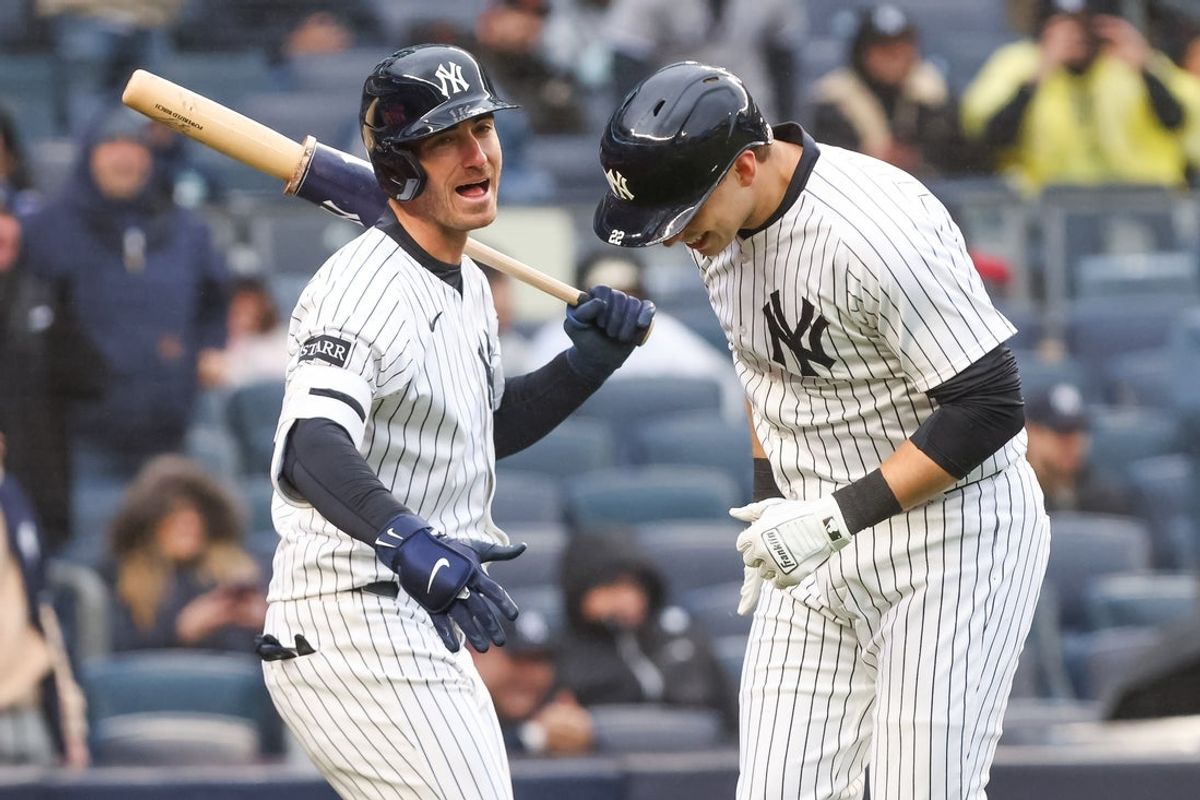 Apr 12, 2025; Bronx, New York, USA; New York Yankees first base Ben Rice (22) celebrates with outfielder Cody Bellinger (35) after hitting a solo home run against the San Francisco Giants during the sixth inning at Yankee Stadium. Mandatory Credit: Tom Horak-Imagn Images