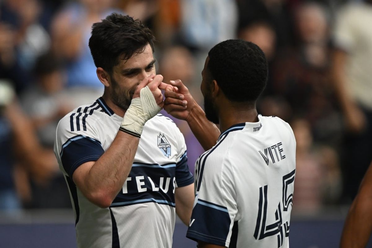 Apr 12, 2025; Vancouver, British Columbia, CAN;  Vancouver Whitecaps FC forward Brian White (24) celebrates with midfielder Pedro Vite (45) after scoring against Austin FC during the first half at BC Place. Mandatory Credit: Anne-Marie Sorvin-Imagn Images