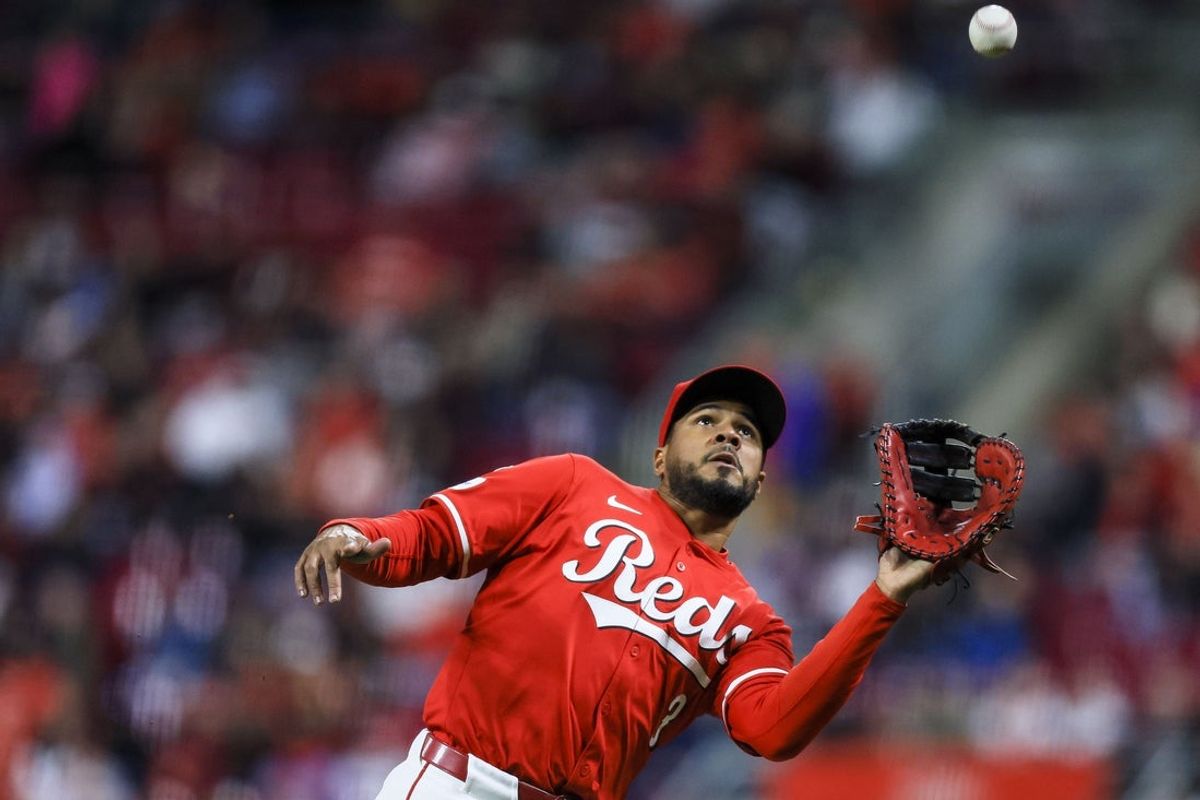 Apr 12, 2025; Cincinnati, Ohio, USA; Cincinnati Reds first baseman Jeimer Candelario (3) catches a pop up hit by Pittsburgh Pirates outfielder Tommy Pham (not pictured) in the ninth inning at Great American Ball Park. Mandatory Credit: Katie Stratman-Imagn Images