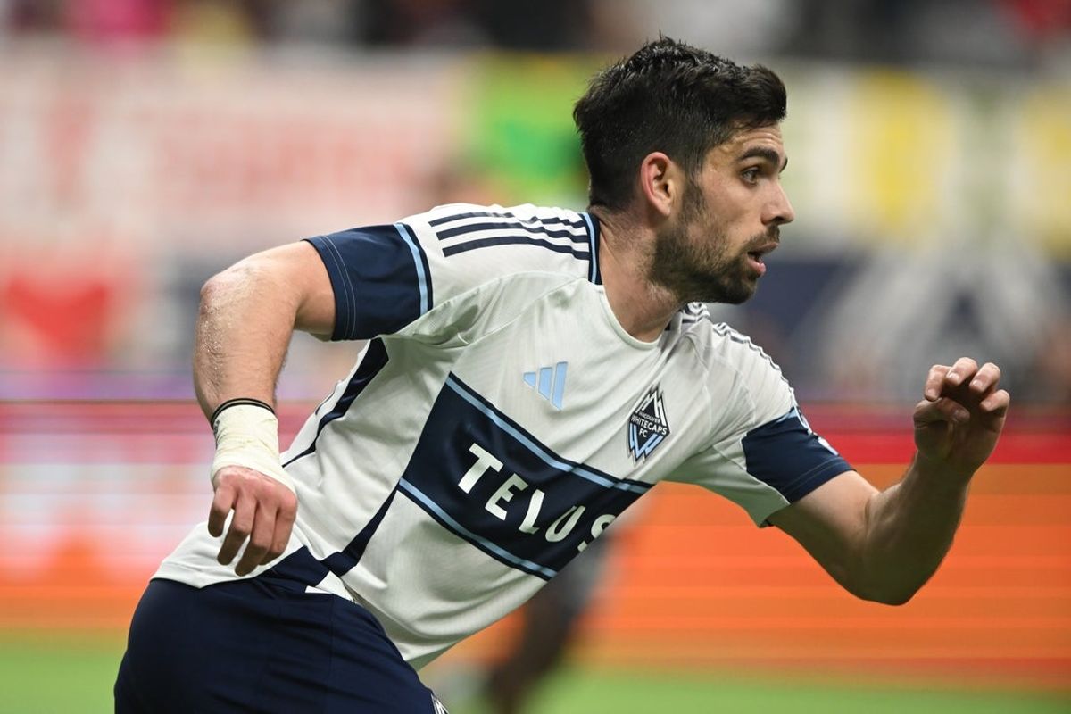 Apr 12, 2025; Vancouver, British Columbia, CAN;  Vancouver Whitecaps FC forward Brian White (24) runs down the pitch during the second half against Austin FC at BC Place. Mandatory Credit: Anne-Marie Sorvin-Imagn Images