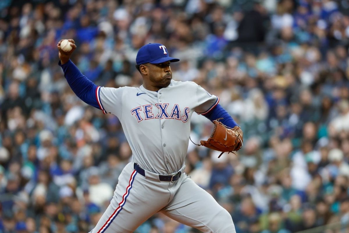Apr 12, 2025; Seattle, Washington, USA; Texas Rangers starting pitcher Kumar Rocker (80) throws against the Seattle Mariners during the first inning at T-Mobile Park. Mandatory Credit: Joe Nicholson-Imagn Images