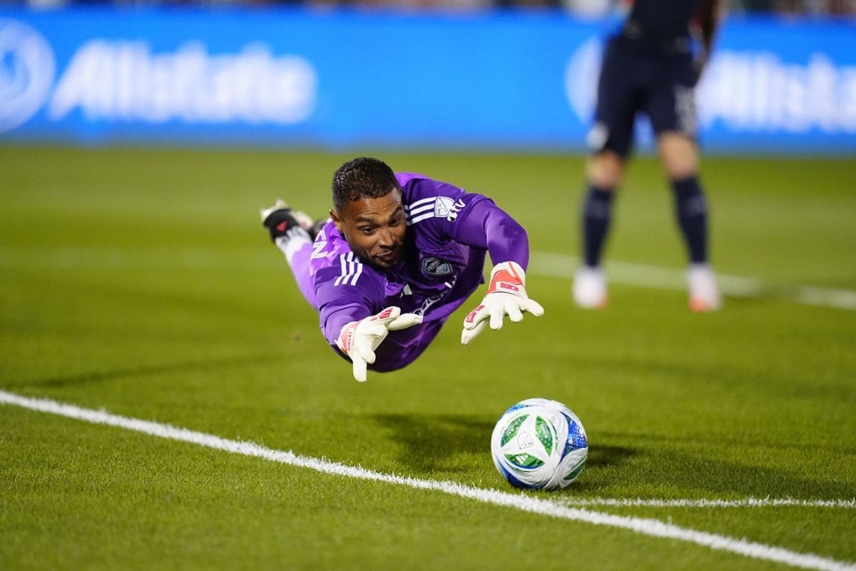 Apr 12, 2025; Commerce City, Colorado, USA; Colorado Rapids goalkeeper Zack Steffen (1) leaps for the ball in the first half against San Diego FC at Dick's Sporting Goods Park. Mandatory Credit: Ron Chenoy-Imagn Images