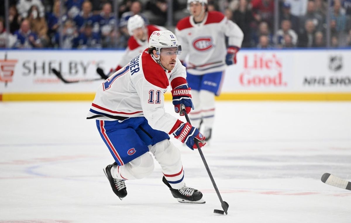 Apr 12, 2025; Toronto, Ontario, CAN;  Montreal Canadiens forward Brendan Gallagher (11) brings the puck up ice against the Toronto Maple Leafs in the second period at Scotiabank Arena. Mandatory Credit: Dan Hamilton-Imagn Images