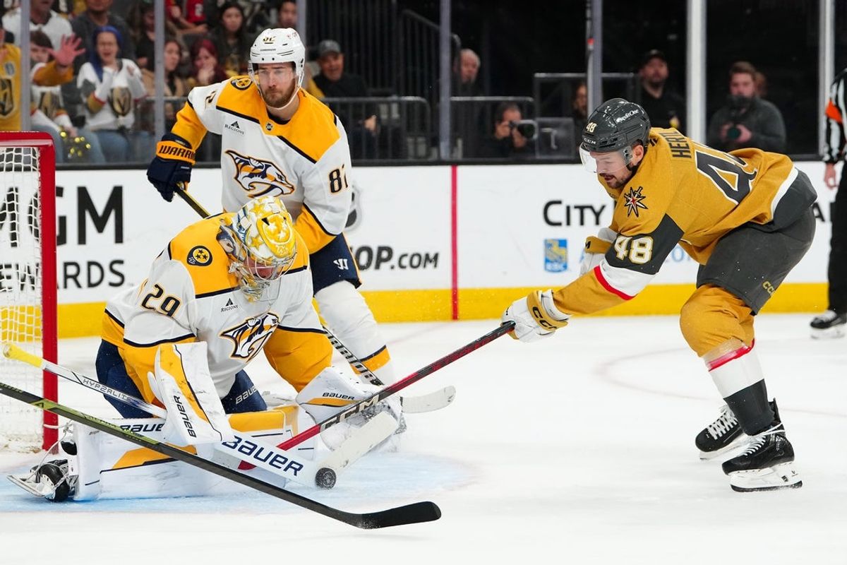 Apr 12, 2025; Las Vegas, Nevada, USA; Nashville Predators goaltender Justus Annunen (29) makes a save as Vegas Golden Knights center Tomas Hertl (48) looks for the rebound during the first period at T-Mobile Arena. Mandatory Credit: Stephen R. Sylvanie-Imagn Images