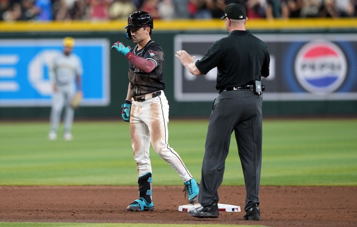 Apr 12, 2025; Phoenix, Arizona, USA; Arizona Diamondbacks outfielder Corbin Carroll (7) celebrates a two RBI double during the ninth inning at Chase Field. Mandatory Credit: Joe Camporeale-Imagn Images