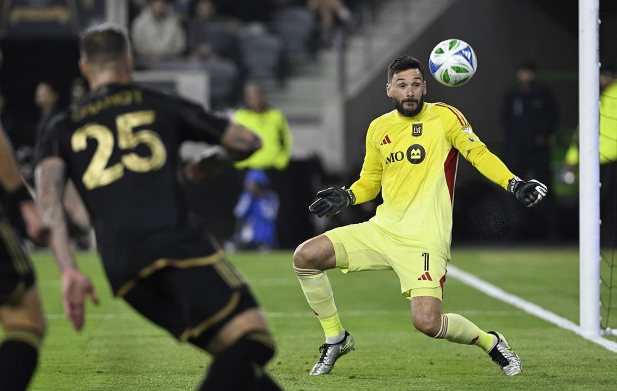 Apr 12, 2025; Los Angeles, California, USA; Los Angeles FC goalkeeper Hugo Lloris (1) makes a save against the San Jose Earthquakes during the first half at BMO Stadium. Mandatory Credit: Alex Gallardo-Imagn Images