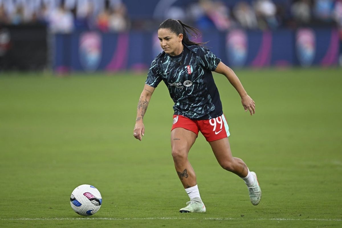 Apr 12, 2025; San Diego, California, USA; Kansas City Current midfielder Debinha (99) warms-up before a game against the San Diego Wave FC at Snapdragon Stadium. Mandatory Credit: Denis Poroy-Imagn Images